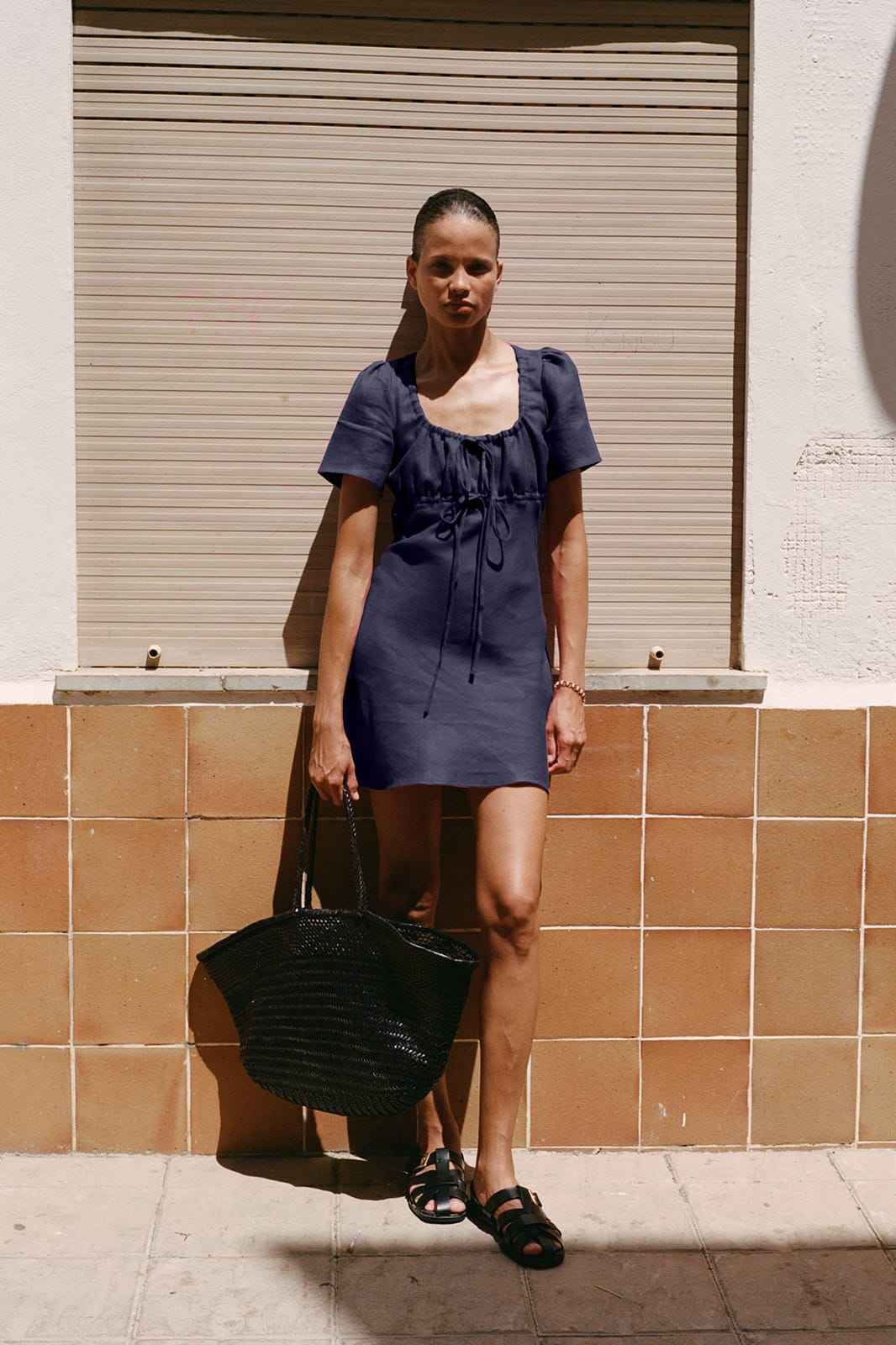 The Clementine Mini Dress in navy blue