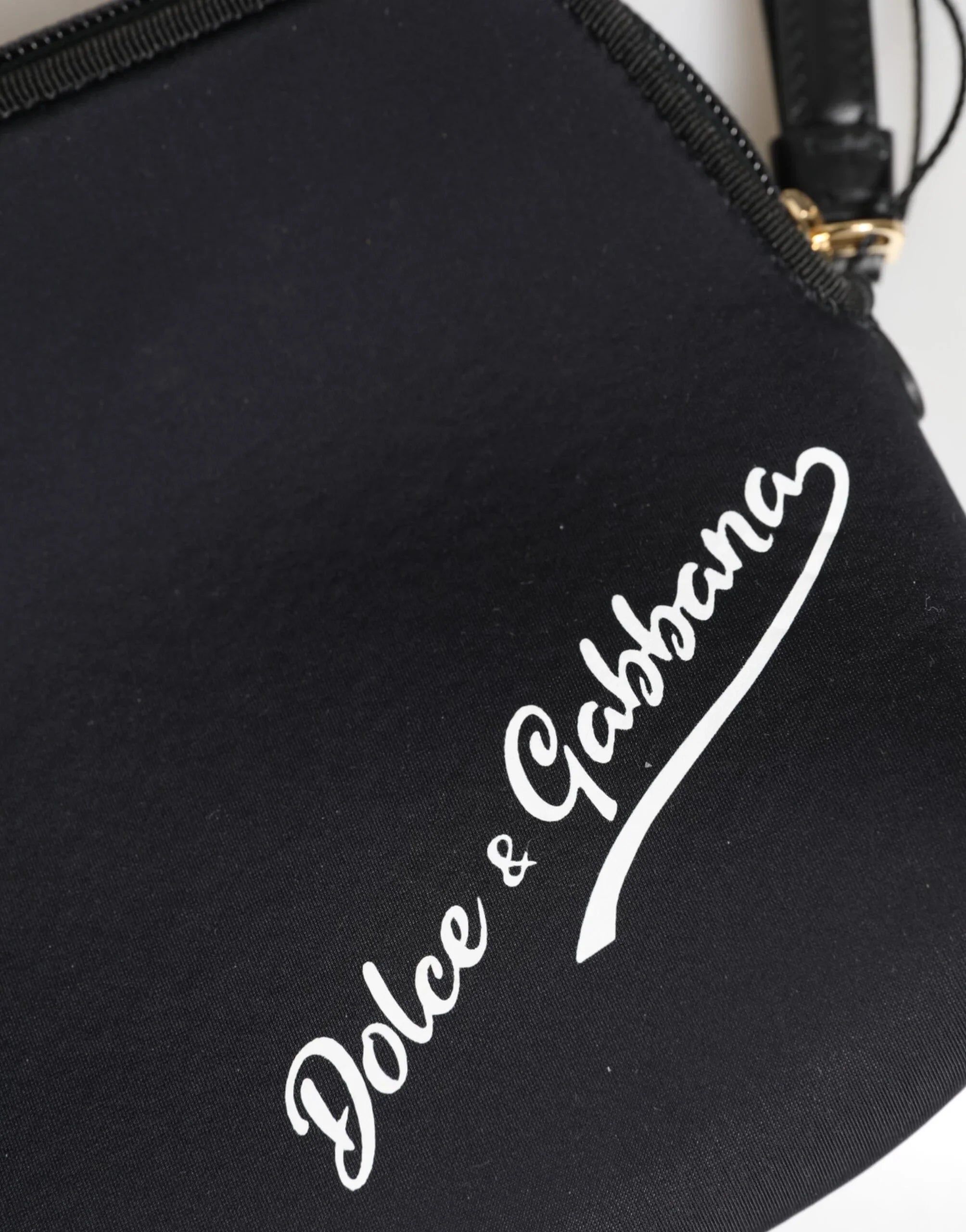 Dolce &amp; Gabbana Clutch aus schwarzem, einfarbigem Nylon mit DG-Logoprint und Reißverschlusstasche