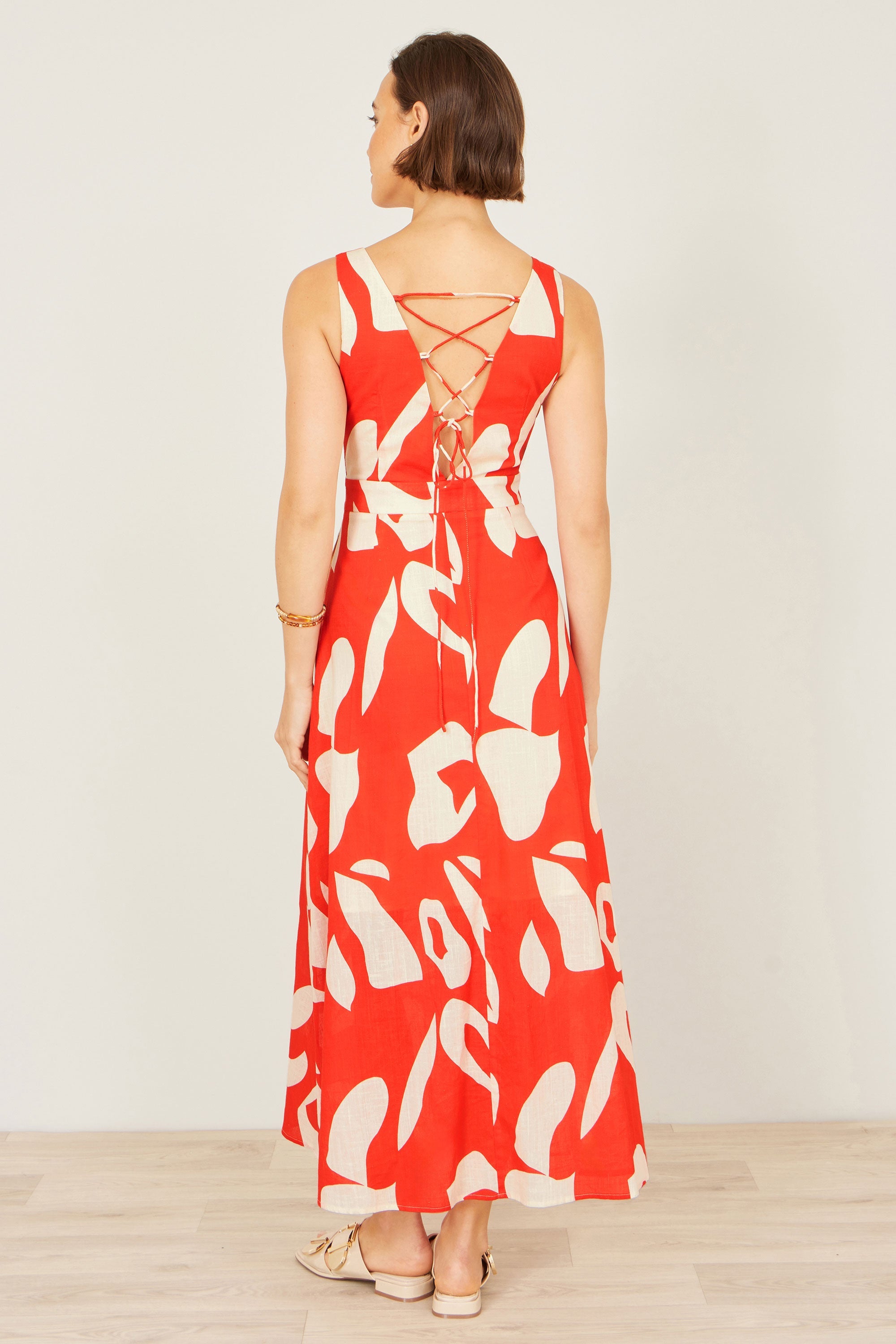 Yumi Orange Abstract Maxi Dress With Tie Back