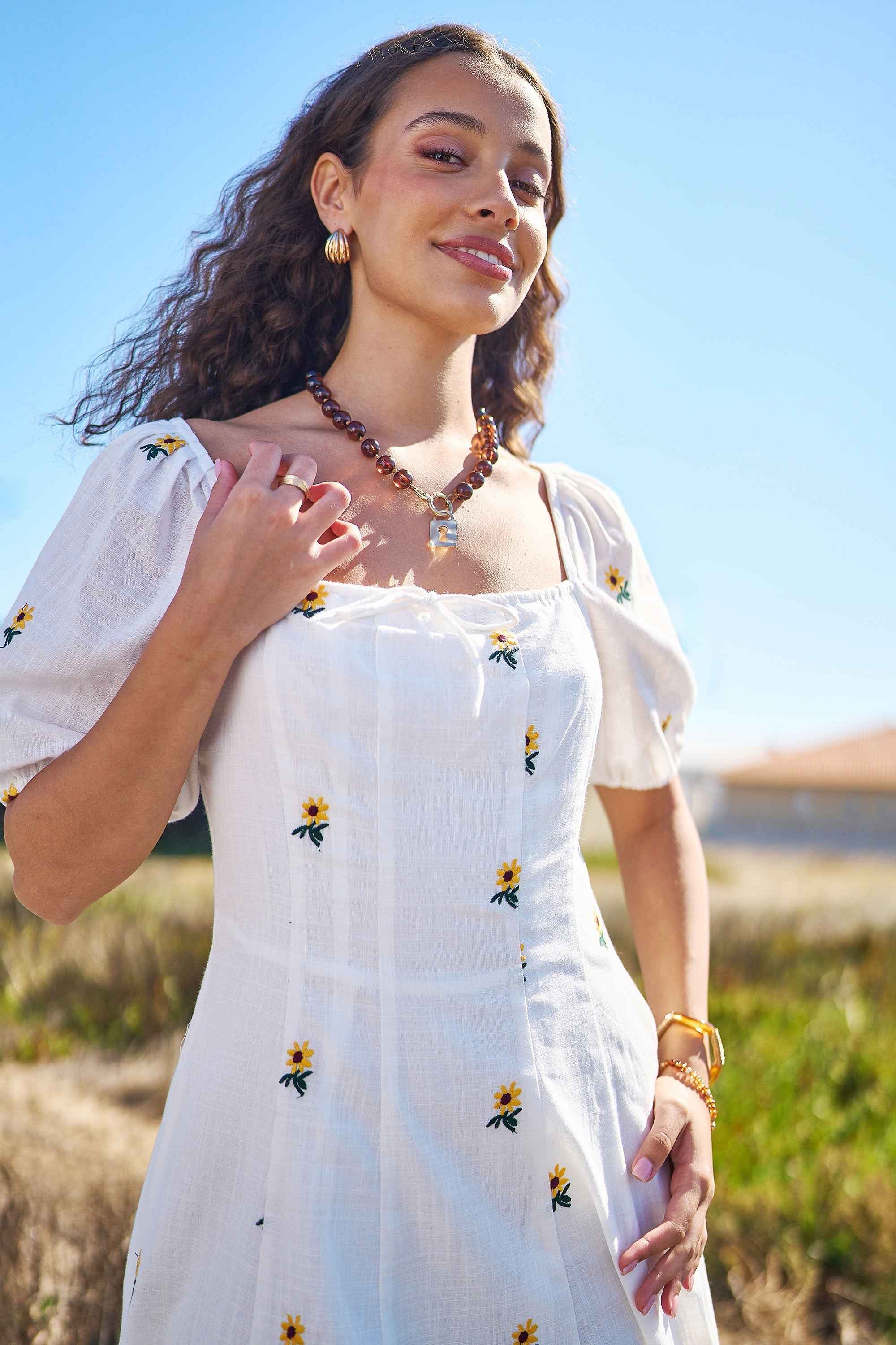 Yumi White Cotton Sunflower Embroidered Midi Dress