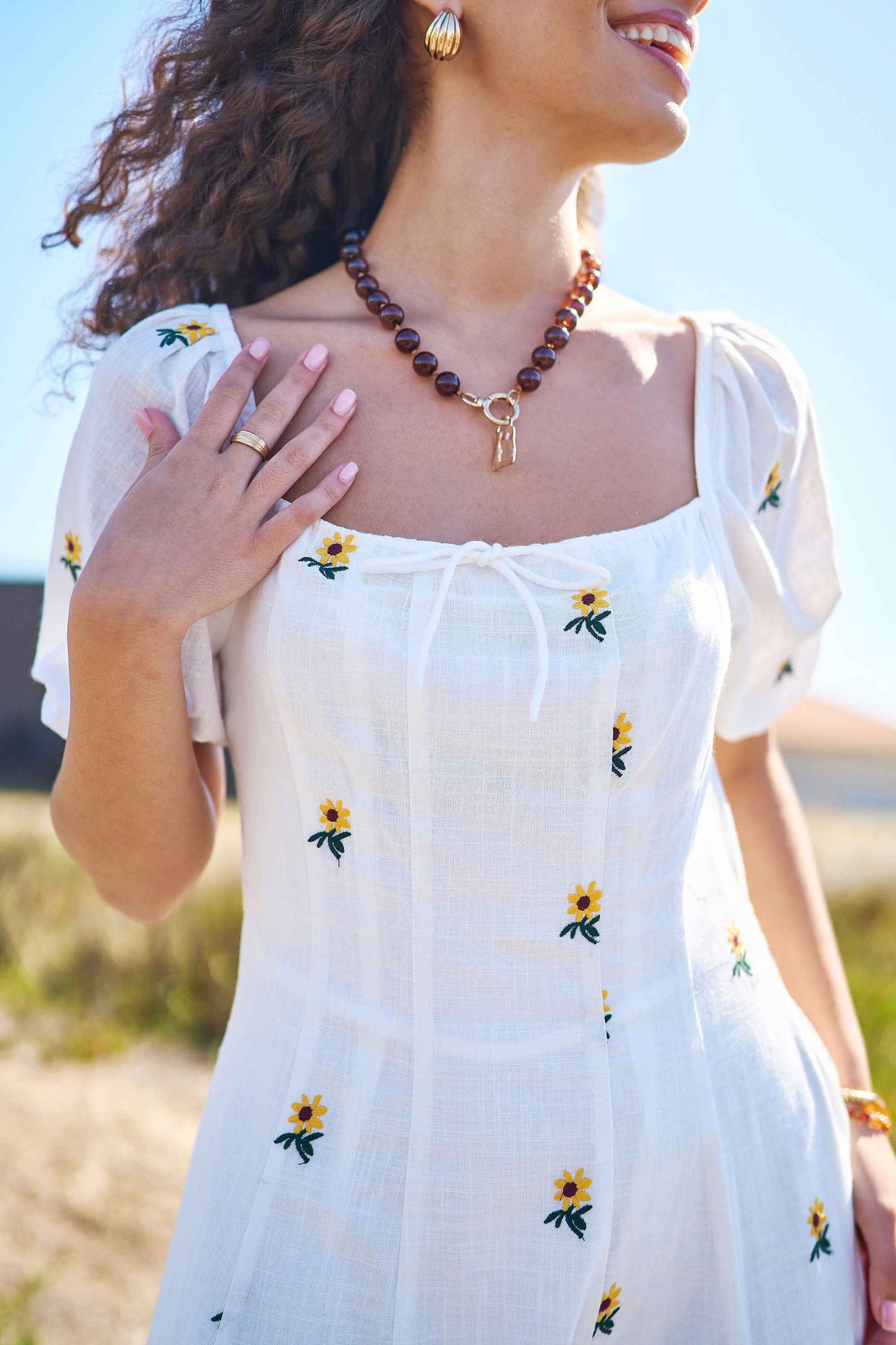 Yumi White Cotton Sunflower Embroidered Midi Dress