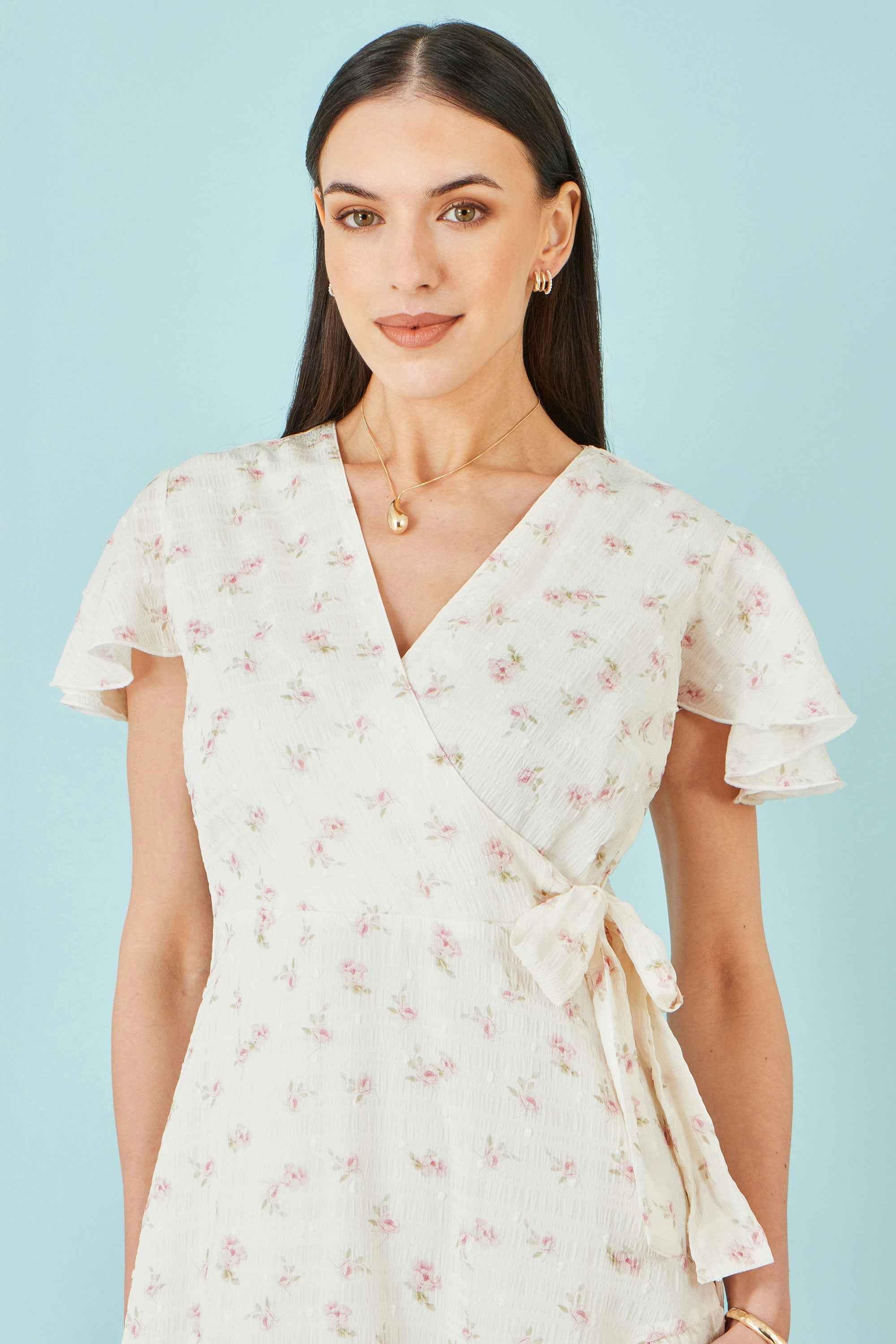 Yumi White Rose Print Wrap Over Frill Dress